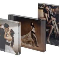 Three acrylic photo block prints displaying wedding, maternity, and boudoir portraits, shown as a display option for boudoir images from Primal Soul Boudoir in Rosenberg, Texas.